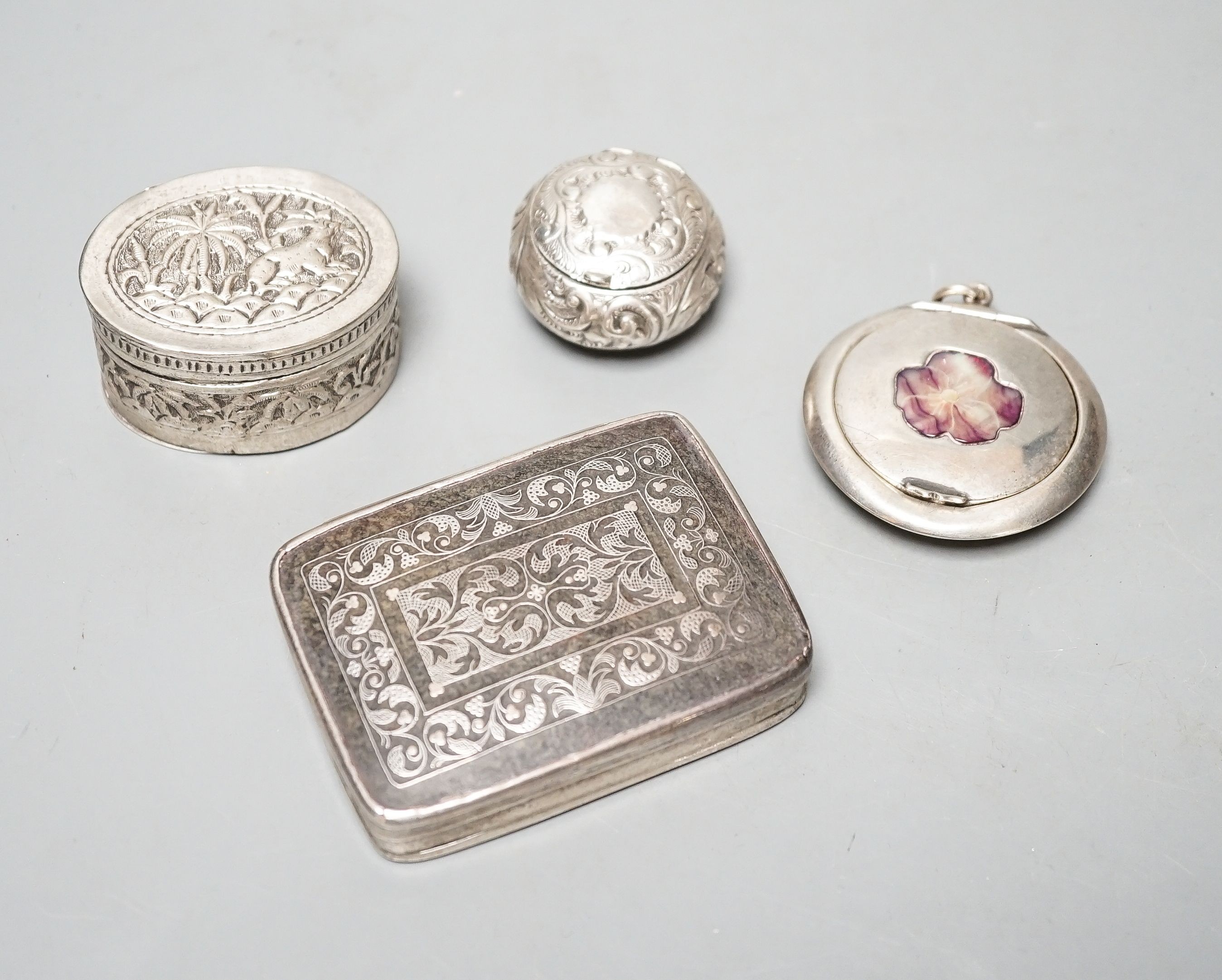 A selection of three small silver or white metal boxes to include a tortoiseshell pique box and a silver and shell inlaid compact.